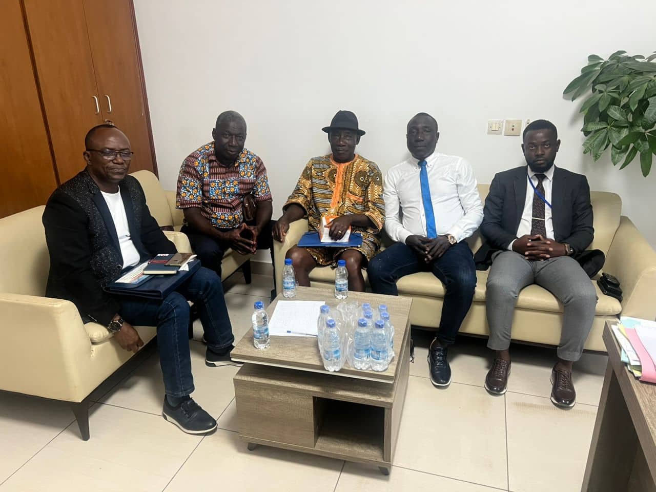 Two men in suits talking